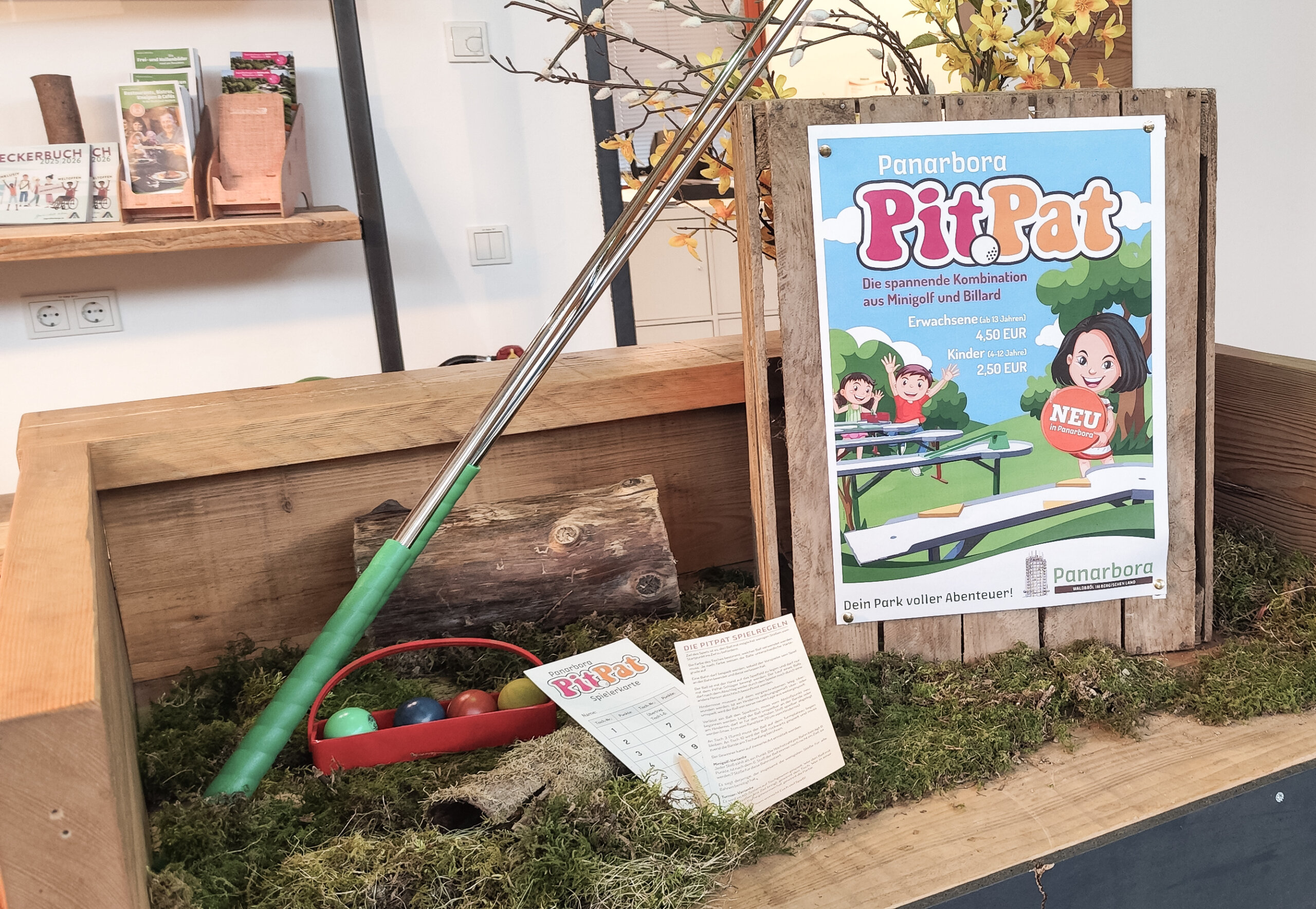 PitPat-Ausrüstung inklusive einem PitPat-Plakat